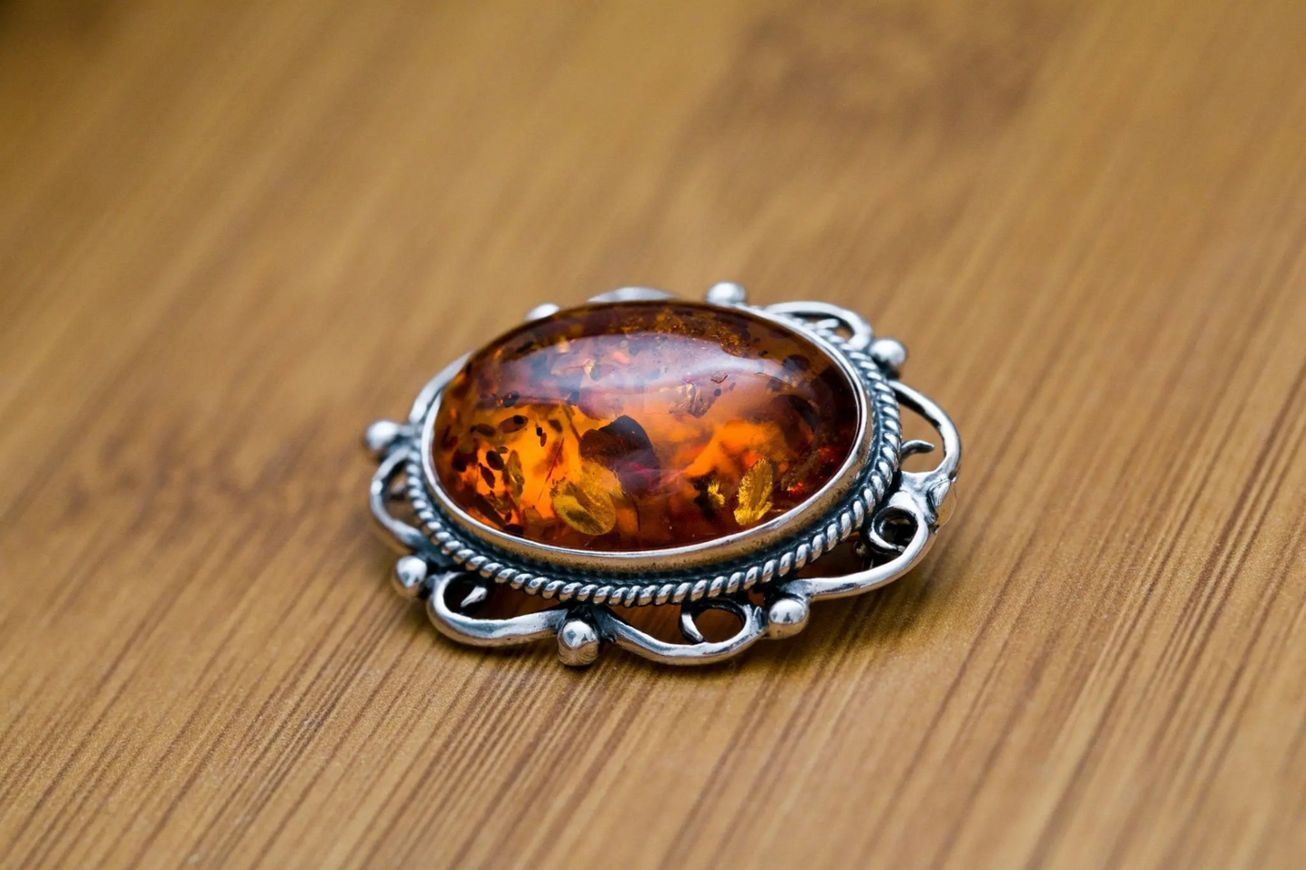 Oval Classic Framed Amber Brooch